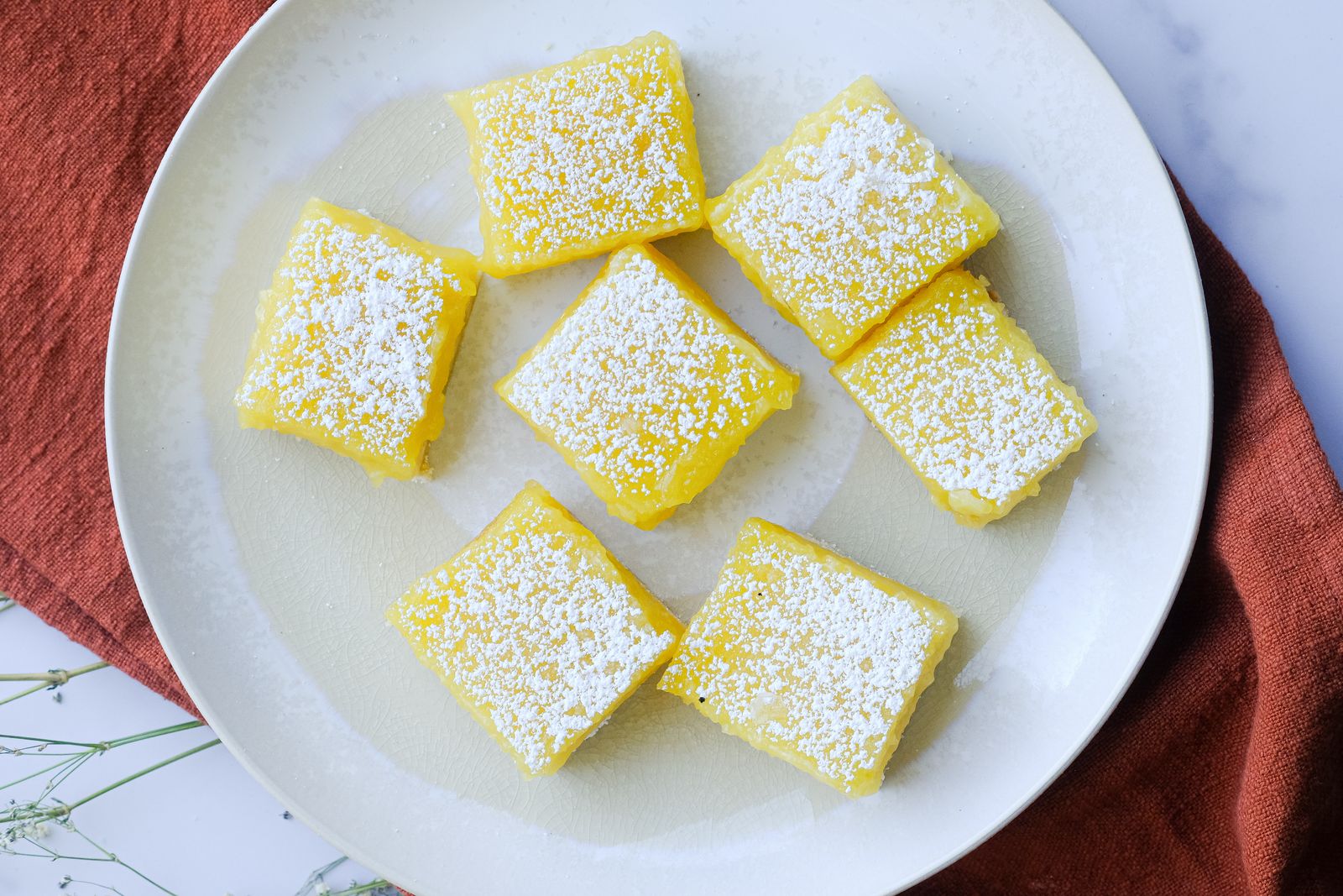 Lemon bars dusted with powdered sugar