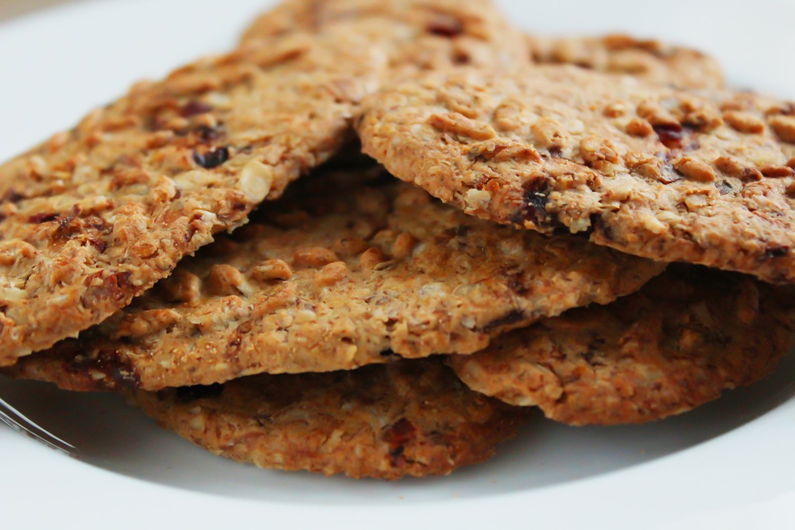 Oatmeal raisin cookies on a cooling rack